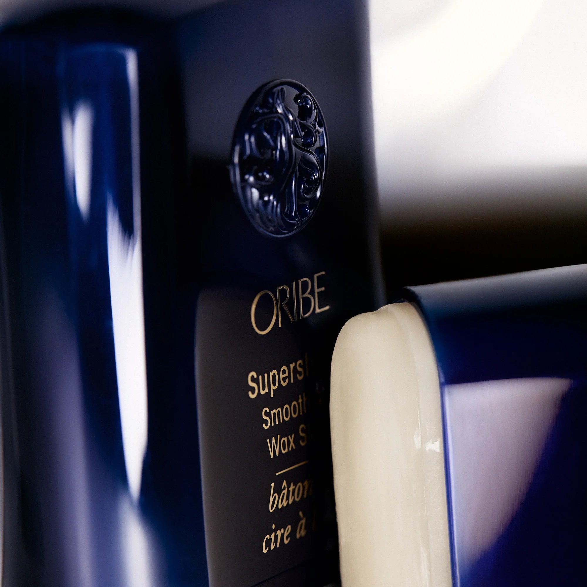 Supershine Smoothing Wax Stick - Professional Hair Care by Oribe at Capelli Salon Studio Saskatoon