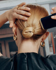 Supershine Smoothing Wax Stick - Professional Hair Care by Oribe at Capelli Salon Studio Saskatoon
